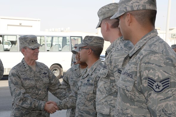 U.S. Air Force Gen. Hawk Carlisle, commander of Air Combat Command, greets Expeditionary Force Support Squadron Airmen during his immersion tour at an undisclosed location in Southwest Asia Nov. 24, 2014. During his visit, Carlisle addressed some of the Air Force's top issues including force management, sexual assault, and suicide. (U.S. Air Force photo/Tech. Sgt. Marie Brown)	