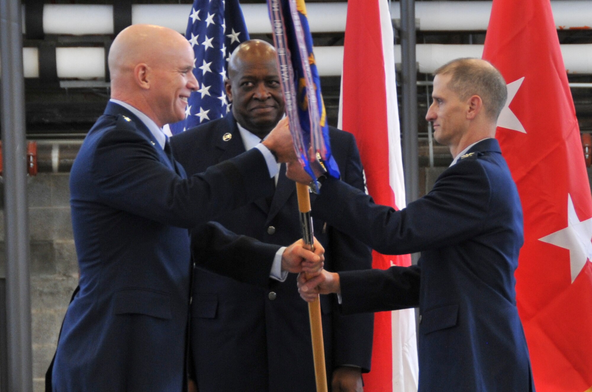 Brig. Gen. Steven J. Berryhill officiates the change of command ceremony where Col. Randal K. Efferson assumes command of the 187th Fighter Wing, Montgomery Regional Air National Guard Base, Montgomery, Ala., Jan 10, 2015. Efferson took command of the fighter wing from Col. Samuel W. Black. (U.S. Air National Guard photo by Tech. Sgt. Monique Randall / Released)