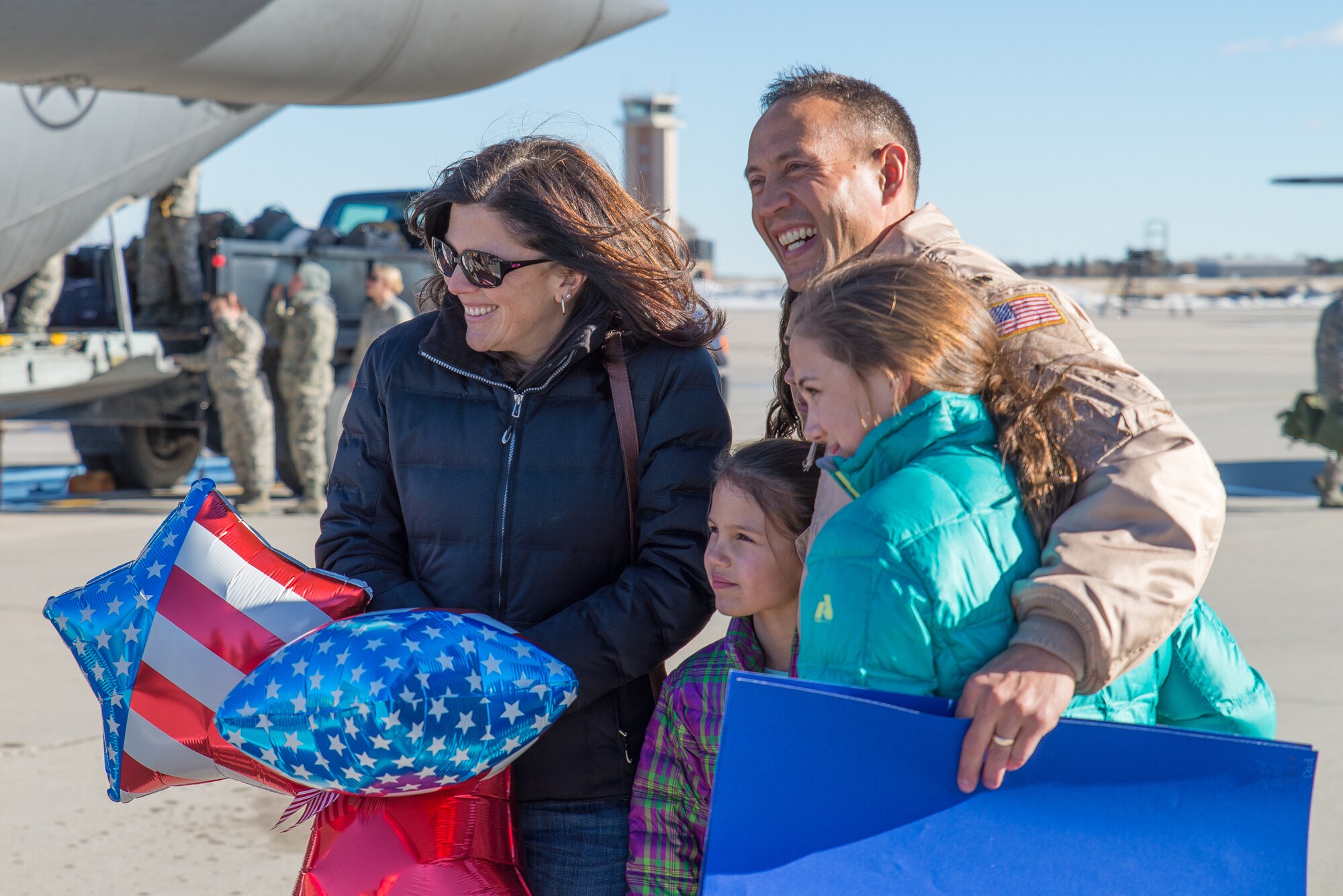 Family members welcome home U.S. Air Force Airmen from the 153rd Airlift Wing, Wyoming Air National Guard Jan. 8, 2015 at Cheyenne Air National Guard Base in Cheyenne, Wyoming. Around 60 members of the 153rd Airlift Wing, Wyoming Air National Guard, returned home this week following a two-month deployment to Southwest Asia