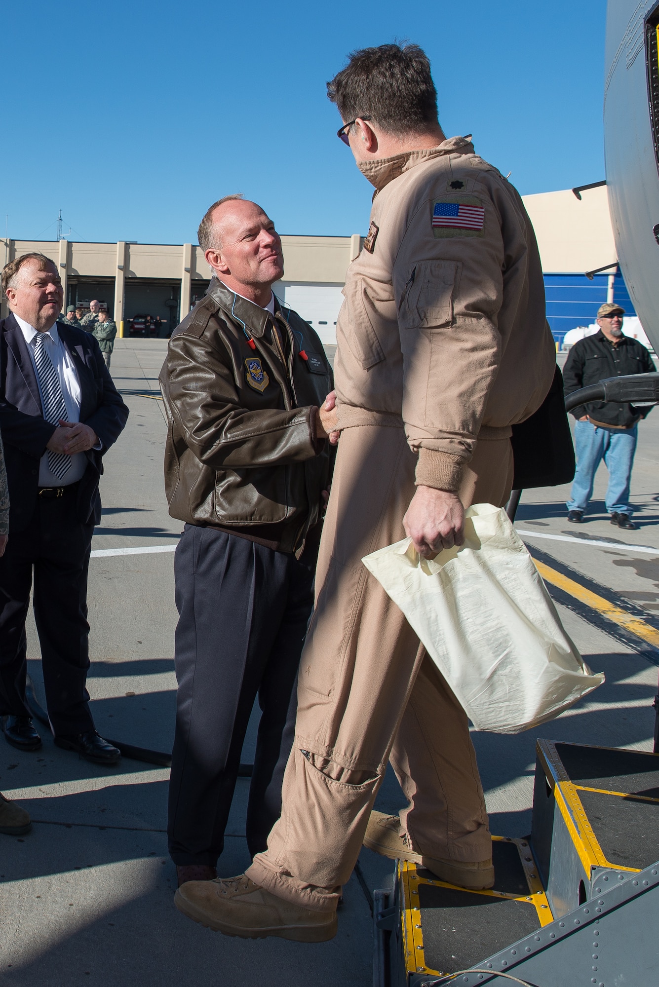 Wyoming Governor Matt Mead welcomes home Lt. Col. Mark Schmidt Jan. 8, 2015 at Cheyenne Air National Guard Base in Cheyenne, Wyoming. Around 60 members of the 153rd Airlift Wing, Wyoming Air National Guard, returned home this week following a two-month deployment to Southwest Asia.