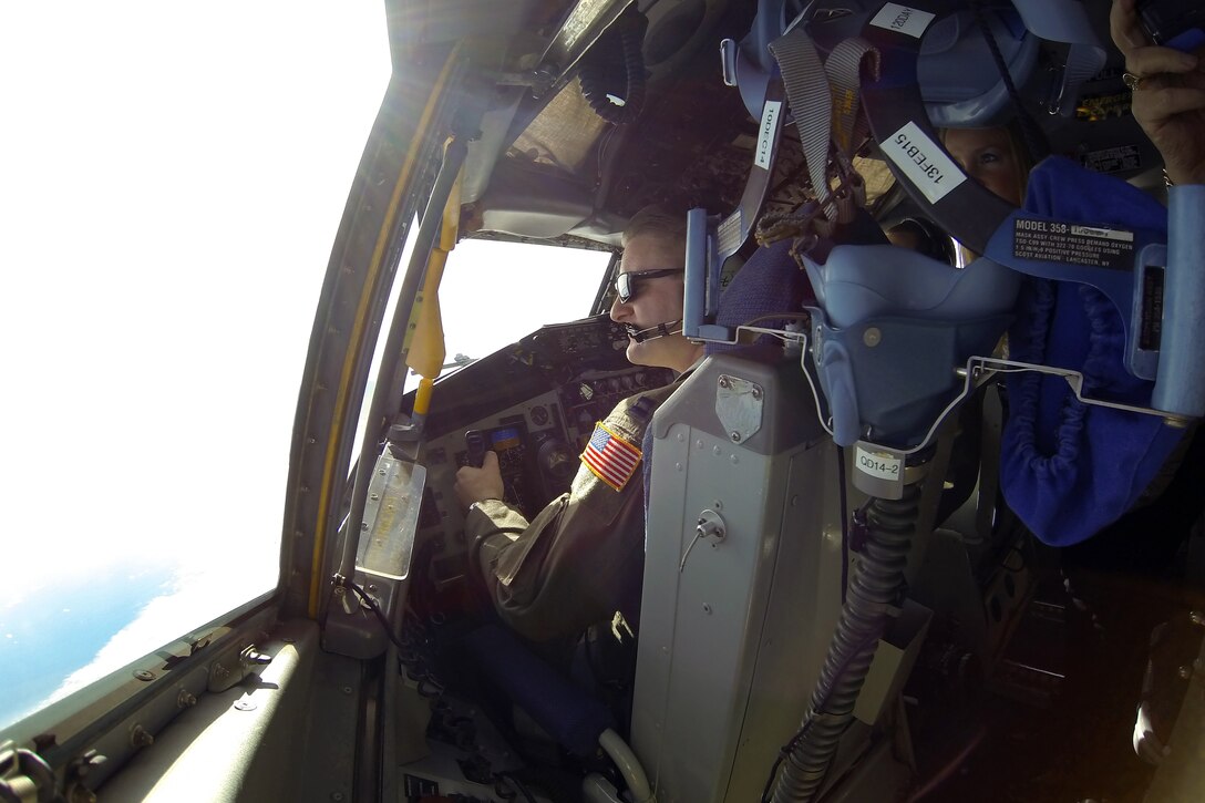 Capt. Brandon McSwain flies a KC-135 Stratotanker from the 916th Air Refueling Wing, Seymour Johnson Air Force Base, North Carolina, Dec. 6, 2014. The flight was part of a 916th ARW Employer Support of the Guard and Reserve event, which allowed employers of traditional Reservists to fly in the KC-135 and observe flight crew members at work. (U.S. Air Force photo by Master Sgt. Wendy Lopedote)  