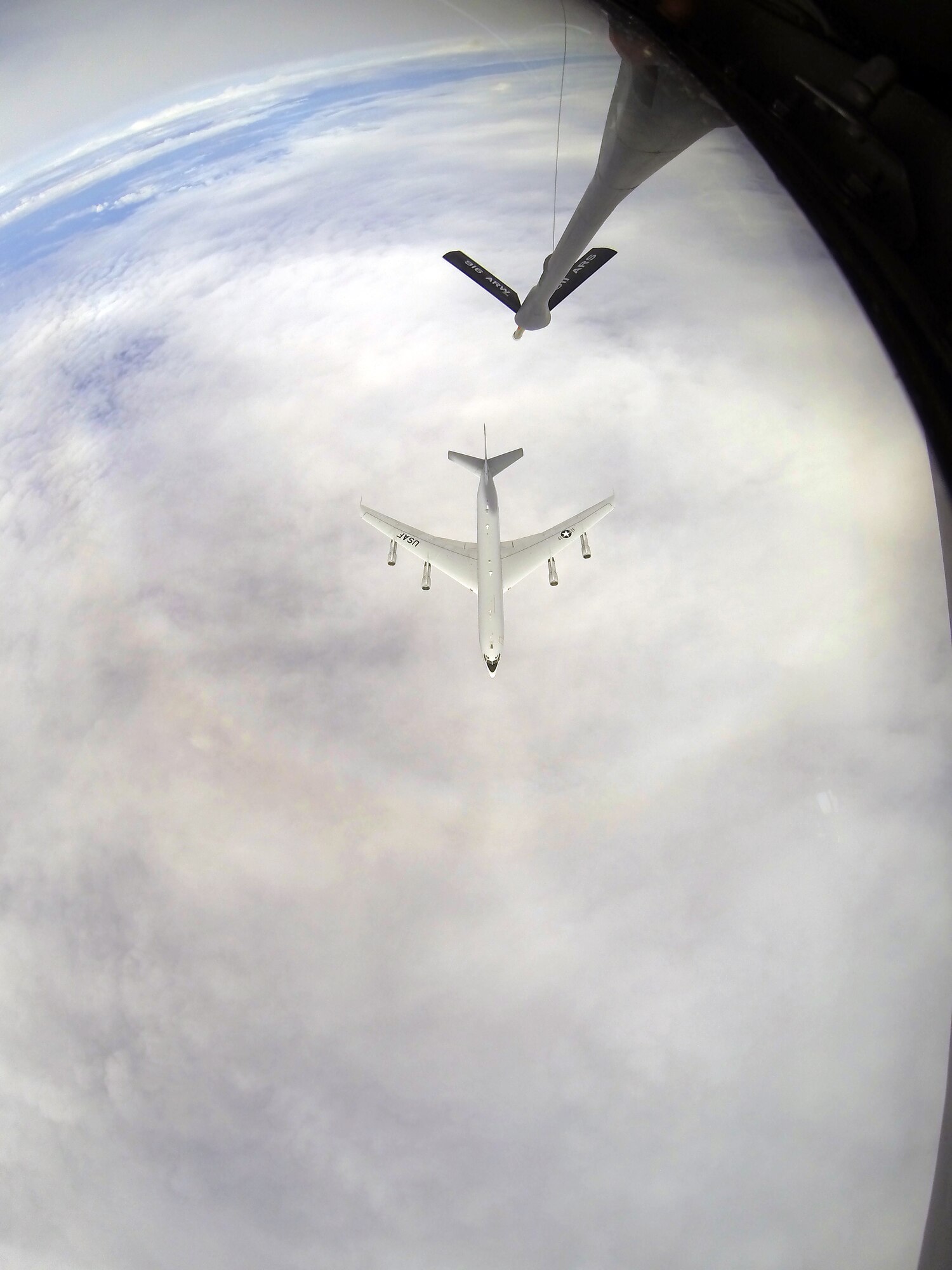 A KC-135R Stratotanker from the 916th Air Refueling Wing, Seymour Johnson Air Force Base, North Carolina, flies with an E-8C Joint Surveillance Target Attack Radar System from the 116th Air Control Wing, Robins AFB, Ga., Dec. 6, 2014. The flight was held in conjunction with a 916th ARW Employer Support of the Guard and Reserve event, which allowed employers of traditional Reservists to fly in the KC-135 and observe the refueling process from the boom operator pod. (U.S. Air Force photo by Master Sgt. Wendy Lopedote)  