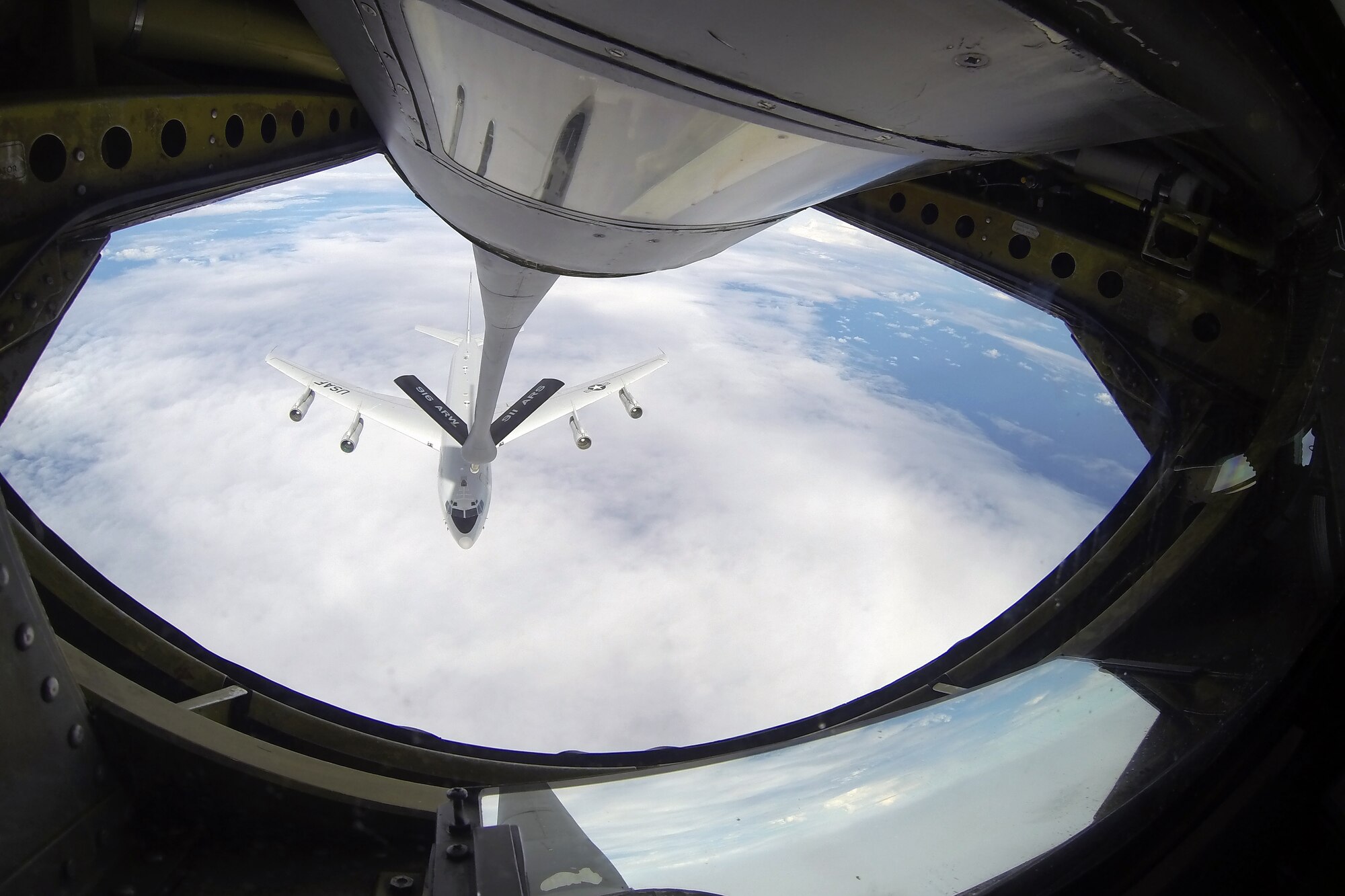 A KC-135R Stratotanker from the 916th Air Refueling Wing, Seymour Johnson Air Force Base, North Carolina, prepares to refuel an E-8C Joint Surveillance Target Attack Radar System from the116th Air Control Wing, Robins AFB, Ga., Dec. 6, 2014. The flight was in conjunction with a 916th ARW Employer Support of the Guard and Reserve event, which allowed employers of traditional Reservists to fly in the KC-135 and observe the refueling process from the boom operator pod. (U.S. Air Force photo by Master Sgt. Wendy Lopedote)   
