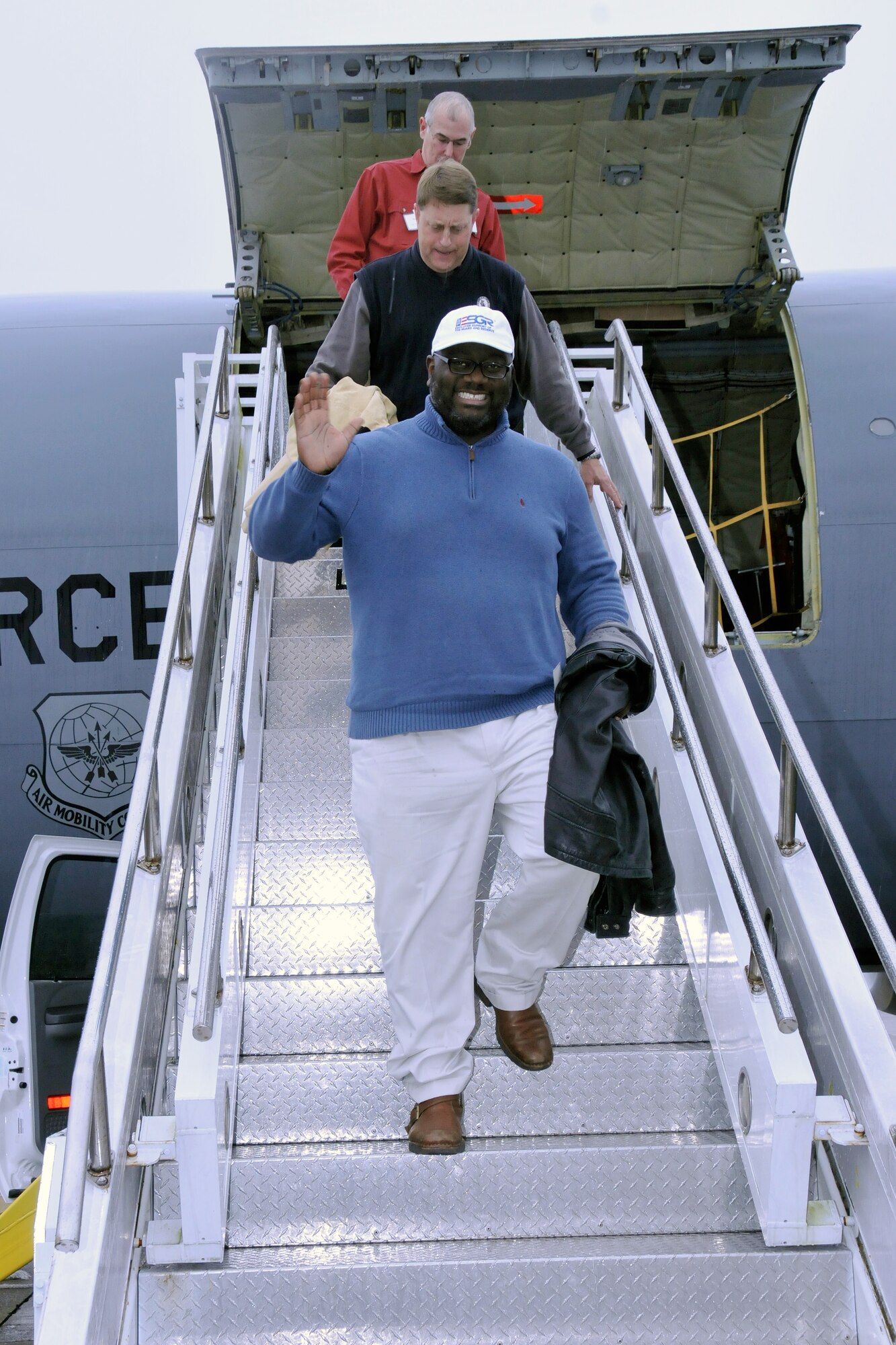 Passengers exit a KC-135R Stratotanker from the 916th Air Refueling Wing after landing at Seymour Johnson Air Force Base, North Carolina, Dec. 6, 2014. The guests were participating in an Employer Support of the Guard and Reserve event, which allowed employers of traditional Reservists to fly in the KC-135 and observe the air refueling process. (U.S. Air Force photo by Tech. Sgt. Terrica Jones)