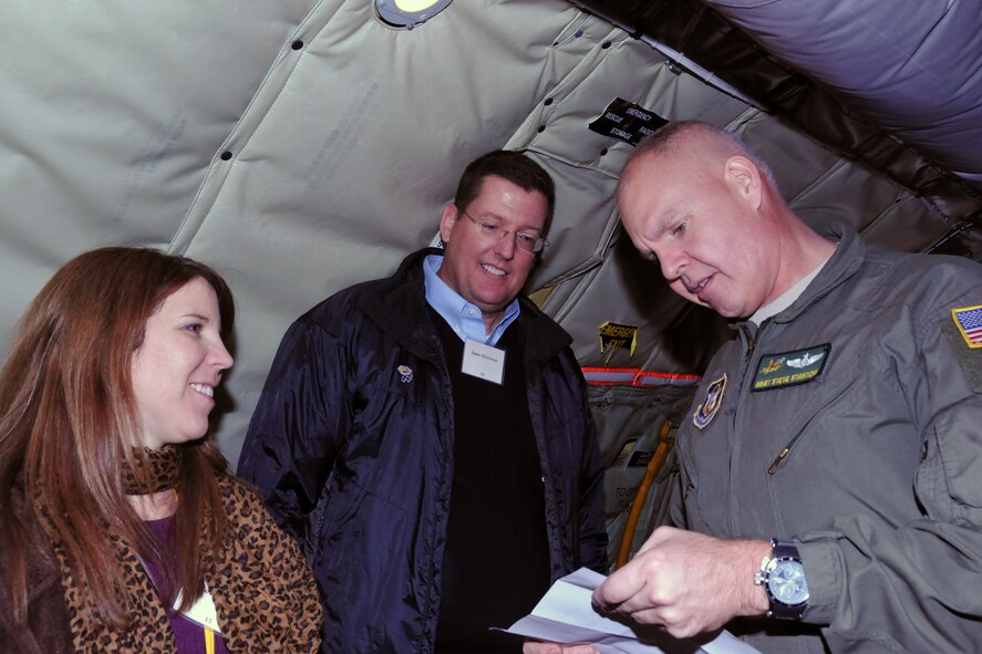 Master Sgt. Steve Stanton, 77th Air Refueling Squadron boom operator, speaks with guests of a 916th Air Refueling Wing employer flight, Dec. 6, 2014. The event was sponsored by the Employer Support of the Guard and Reserve and is designed to facilitate a good relationship between the wing and those employ traditional Reservists. (U.S. Air Force photo by Tech. Sgt. Terrica Jones)