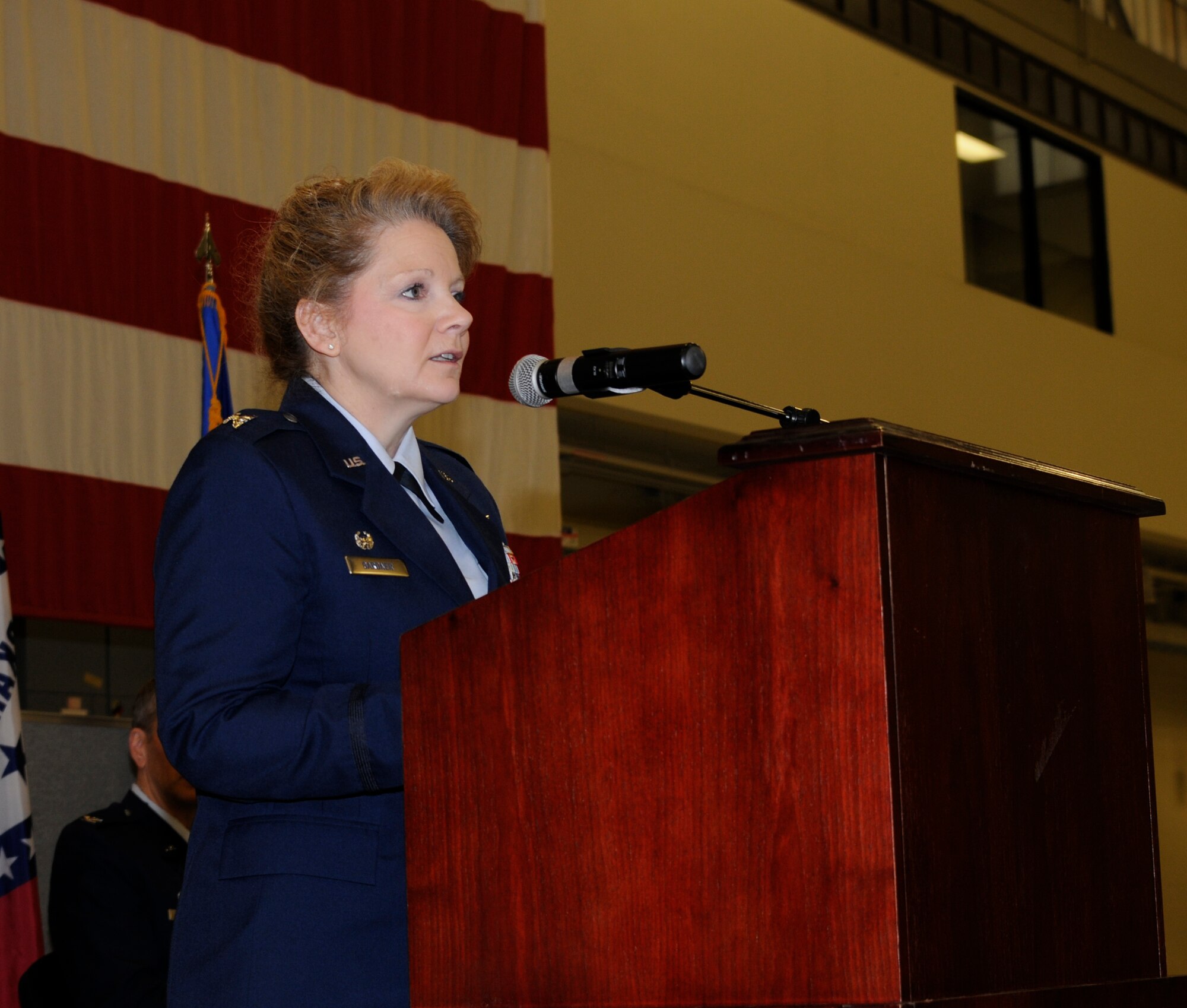 Col. Tenise Gardner, 188th Mission Support Group commander, speaks after being promoted to colonel during a promotion ceremony held Jan. 11, 2015 at Ebbing Air National Guard Base, Fort Smith, Ark. Gardner first enlisted in the 188th in 1987 as an information manager and received her commission in 1991. This marks the second time in wing history that a female has been promoted to the rank of colonel. (U.S. Air National Guard photo by Staff Sgt. Hannah Dickerson/released)