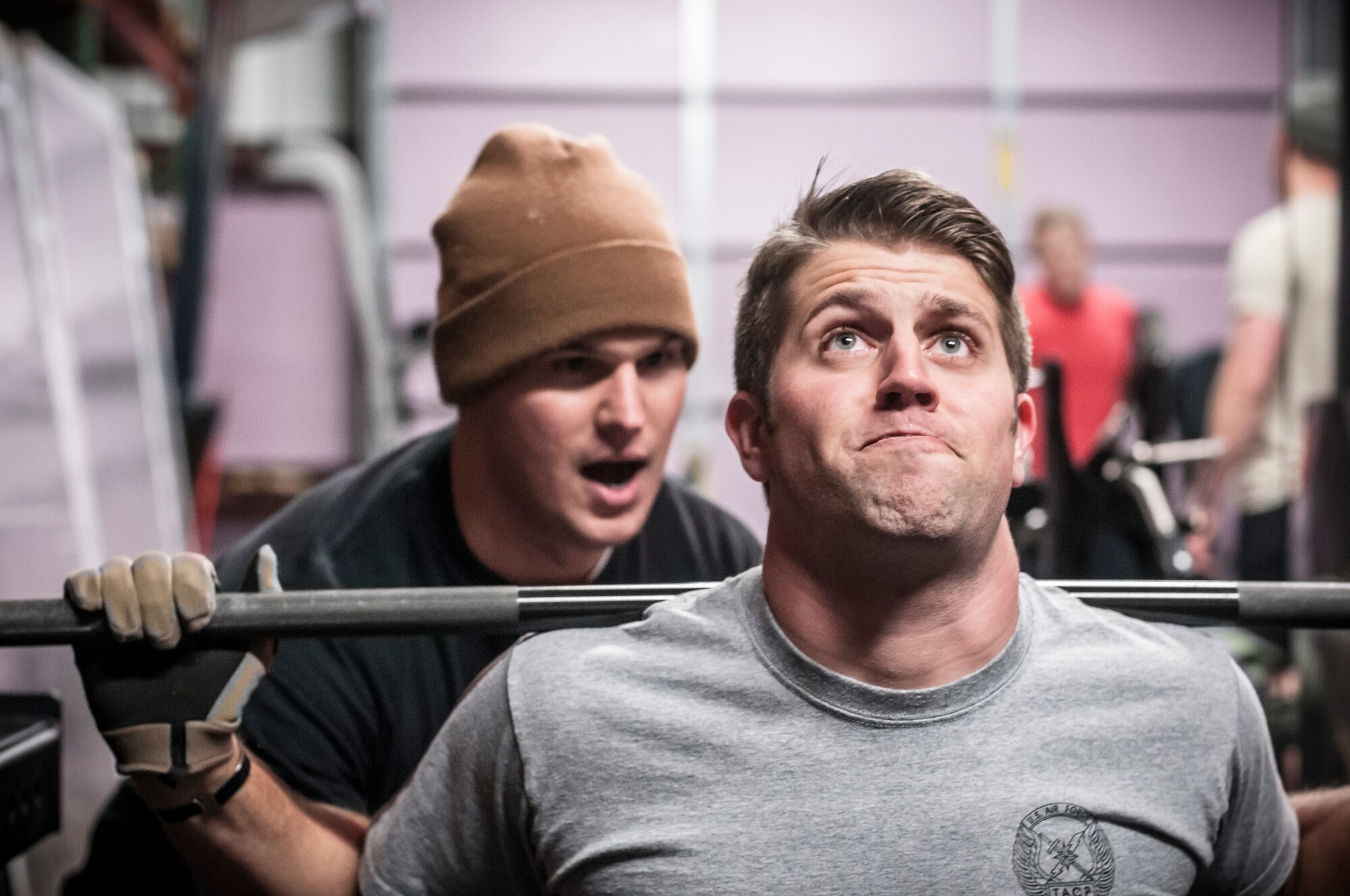 Staff Sgt. Cody Canfield performs a back squat as Staff Sgt. Matthew Denault encourages and spots him during a weighted lift. Both Airman from the 169th Air Support Operations Squadron, Peoria, IL, train together on a regular basis to maintain a high fitness requirement there career field requires on January 10, 2015. As Joint Terminal Attack Controllers the demanding job needs each airman to perform at peak performance alongside their Army counterparts out in the field. Besides the fitness benefits the members are getting teamwork, camaraderie and morale building are big advantages they are creating. They are building physical strength but more importantly the strength of teamwork to take to the battlefield.(U.S. Air National Guard photo by Master Sgt. Scott Thompson/released)