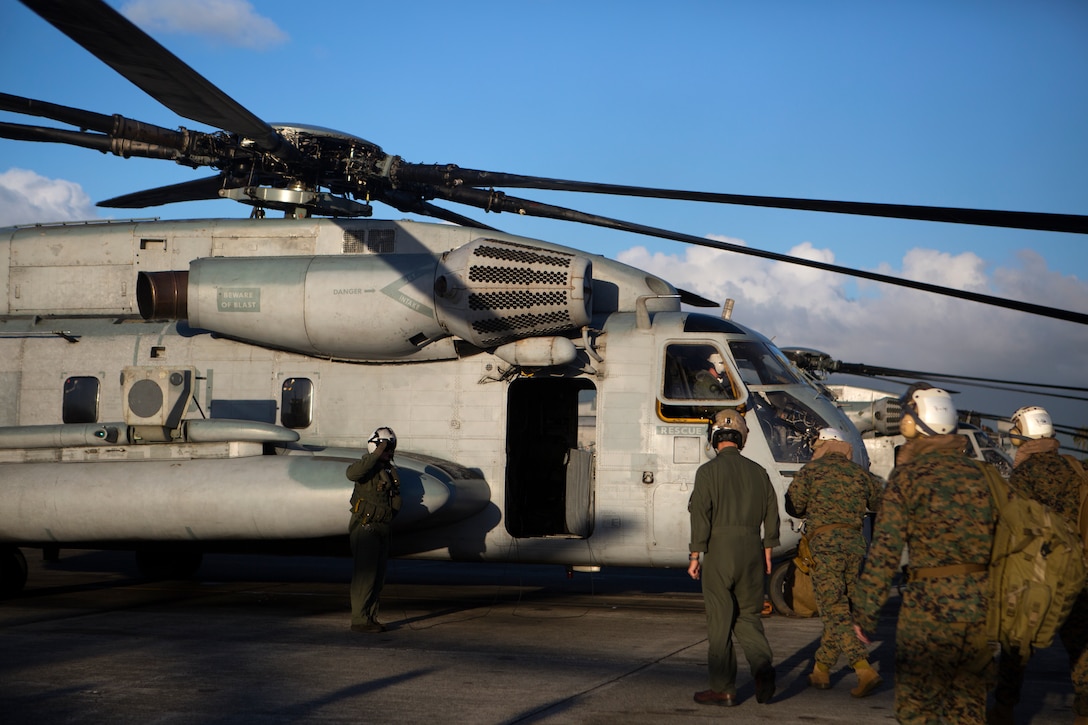 U.S. Marine Corps Forces, Pacific Commander, Lt. Gen. John A. Toolan, Jr., receives a salute from a Marine Heavy Helicopter Squadron crew member prior to boarding a CH-53E Super Stallion helicopter, on Marine Corps Base Hawaii, prior to departing for Pohakuloa Training Area on the Island of Hawaii, Jan. 10. Toolan visited Marines from the 3rd Marine Regiment currently conducting training on PTA as part of Exercise Lava Viper. The Hawaiian Islands allow Marines the ability to conduct training such as, amphibious operations, desert-like warfare tactics, artillery live-fire training and military operations on urban terrain (MOUT). This training is essential to tenant commands readiness, in combat and humanitarian scenarios.