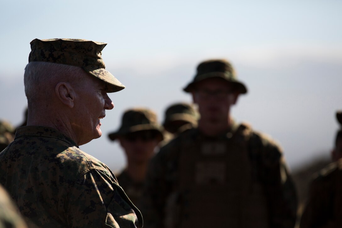 U.S. Marine Corps Forces, Pacific Commander Lt. Gen. John A. Toolan, Jr., speaks with Marines from 2nd Battalion, 3rd Marine Regiment, during his visit to Pohakuloa Training Area on the Island of Hawaii, Jan. 10. Marines from 2nd Bn., 3rd Marines are currently conducting Exercise Lava Viper. The physical nature of PTA builds closer bonds amongst units who endure its high altitude, rough terrain and severe weather conditions while accomplishing their overall mission.
