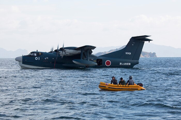 The Japan Maritime Self-Defense Force conducted their first flight training of the year aboard Marine Corps Air Station Iwakuni, Japan, Jan. 7, 2015. The training included: a beginning ceremony, taking flight, amphibious landing and water rescue.