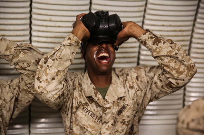 Recruit Devontae Viverette, Platoon 2150, Golf Company, 2nd Recruit Training Battaliom, endure the effects of chlorobenzylidene malonitrile, or CS gas, a non-lethal tear gas and riot control agent at Weapons and Field Training Battalion, Marine Corps Base Camp Pendleton Calif., Dec. 8. The chemicals in the gas cause a burning sensation to the skin and are particularly stringent to the eyes, ears and mouth. Most recruits wind up with tears streaming down their faces, coughing, runny noses and restricted breathing.