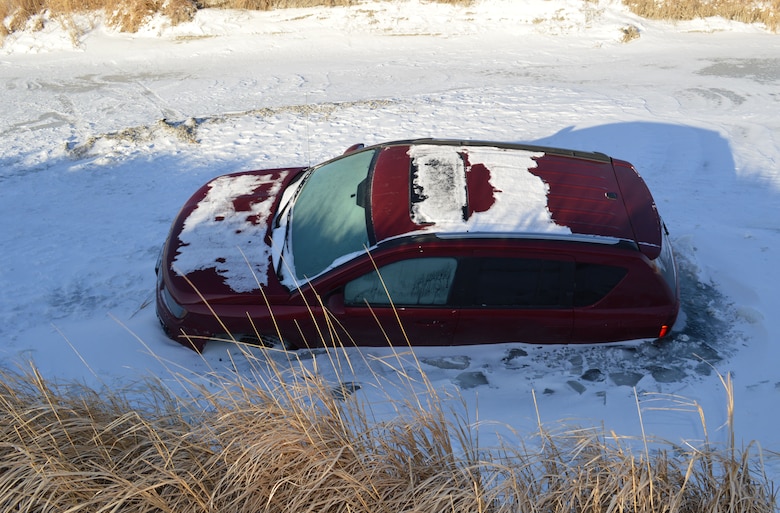 A vehicle breaks through the ice on the Missouri River in North Dakota. The driver escaped safely however driving on the ice must fall within Title 36 Regulations. The practice of "ice driving" or "ice racing" is prohibited and extremely dangerous.