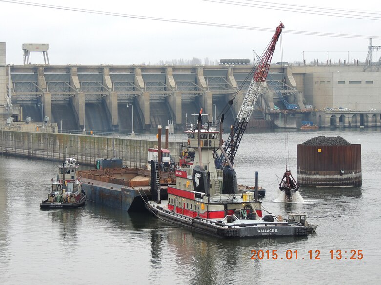 Navigation channel maintenance activities begin today (Jan. 12, 2015) in the downstream navigation lock approach at Ice Harbor Lock and Dam and in the confluence area of the Snake River near Lewiston, Idaho. Sediment removed to re-establish the federal navigation channel on the lower Snake River to Congressionally authorized dimensions of 250 feet wide by 14 feet deep at Minimum Operating Pool will be used to create additional fish habitat at Knoxway Canyon (River Mile 116) downstream of Clarkston, Wash.