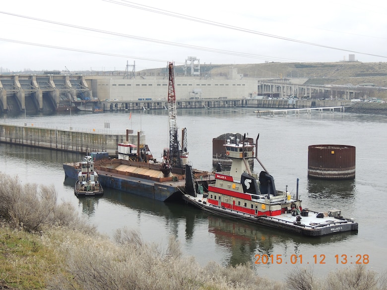 Navigation channel maintenance activities begin today (Jan. 12, 2015) in the downstream navigation lock approach at Ice Harbor Lock and Dam and in the confluence area of the Snake River near Lewiston, Idaho. Sediment removed to re-establish the federal navigation channel on the lower Snake River to Congressionally authorized dimensions of 250 feet wide by 14 feet deep at Minimum Operating Pool will be used to create additional fish habitat at Knoxway Canyon (River Mile 116) downstream of Clarkston, Wash.