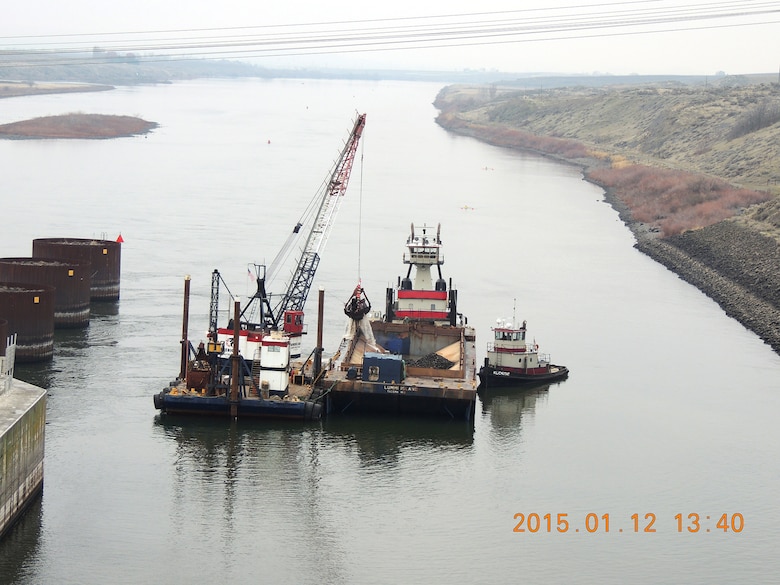 Navigation channel maintenance activities begin today (Jan. 12, 2015) in the downstream navigation lock approach at Ice Harbor Lock and Dam and in the confluence area of the Snake River near Lewiston, Idaho. Sediment removed to re-establish the federal navigation channel on the lower Snake River to Congressionally authorized dimensions of 250 feet wide by 14 feet deep at Minimum Operating Pool will be used to create additional fish habitat at Knoxway Canyon (River Mile 116) downstream of Clarkston, Wash.
