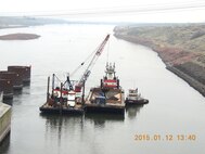 Navigation channel maintenance activities begin today (Jan. 12, 2015) in the downstream navigation lock approach at Ice Harbor Lock and Dam and in the confluence area of the Snake River near Lewiston, Idaho. Sediment removed to re-establish the federal navigation channel on the lower Snake River to Congressionally authorized dimensions of 250 feet wide by 14 feet deep at Minimum Operating Pool will be used to create additional fish habitat at Knoxway Canyon (River Mile 116) downstream of Clarkston, Wash.  