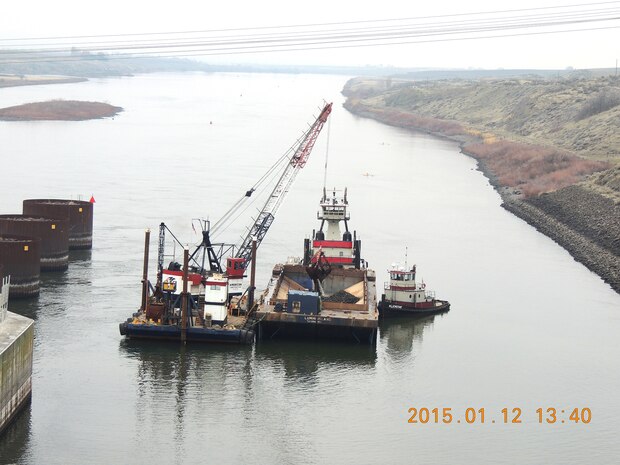Navigation channel maintenance activities begin today (Jan. 12, 2015) in the downstream navigation lock approach at Ice Harbor Lock and Dam and in the confluence area of the Snake River near Lewiston, Idaho. Sediment removed to re-establish the federal navigation channel on the lower Snake River to Congressionally authorized dimensions of 250 feet wide by 14 feet deep at Minimum Operating Pool will be used to create additional fish habitat at Knoxway Canyon (River Mile 116) downstream of Clarkston, Wash.  