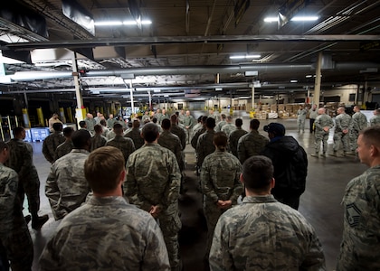 Lt. Gen. Carlton D. Everhart II, 18th Air Force commander, addresses Airmen and civilians from the 437th Aerial Port Squadron and thanks them for their dedication and accomplishments Jan. 8, 2015, at Joint Base Charleston S.C. While visiting JB Charleston, the general toured the 437th Maintenance Group, the 437th Aerial Port Squadron, the 437th Operations Support Squadron and other units across the wing to interact with the Airmen and civilians who work to provide precise, reliable airlift worldwide every day.  (U.S. Air Force photo/Senior Airman Jared Trimarchi)  