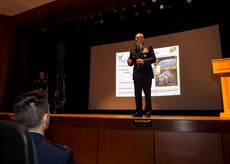 Lt. Gen. Carlton D. Everhart II, 18th Air Force commander, shares his priorities and looks for feedback from Airmen during a 437th Airlift Wing all-call in the base theater Jan. 8, 2015, at Joint Base Charleston S.C. He discussed the challenges the Air Force is currently facing to include budget shortfalls and personnel shortages. He also empowered Airmen to be bold and innovative in their daily endeavors and encourage Airmen to ‘think outside the box’ when facing new challenges. While visiting JB Charleston, the general toured the 437th Maintenance Group, the 437th Aerial Port Squadron, the 437th Operations Support Squadron and other units across the wing to interact with the Airmen and civilians who work to provide precise, reliable airlift worldwide every day.  (U.S. Air Force photo/Senior Airman Jared Trimarchi) 