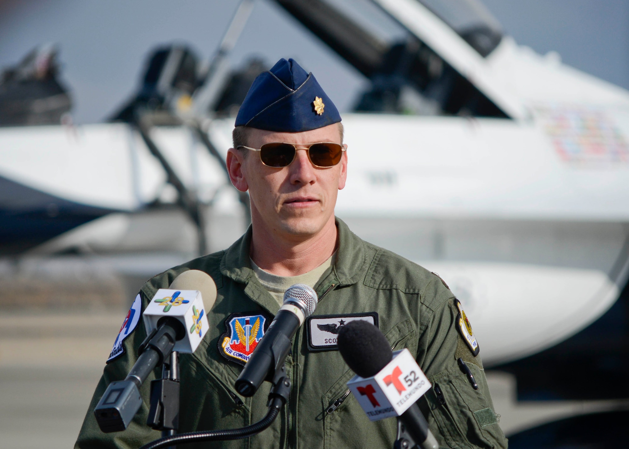 Maj. Scott Petz, pilot of Thunderbird #8, spoke at the William J. Fox Airfield Jan. 9 during a press conference to promote the 2015 Los Angeles County Airshow. The flying unit, officially known as the U.S. Air Force Air Demonstration Squadron, will perform both days of the second annual air show. (U.S. Air Force photo by Rebecca Amber)
