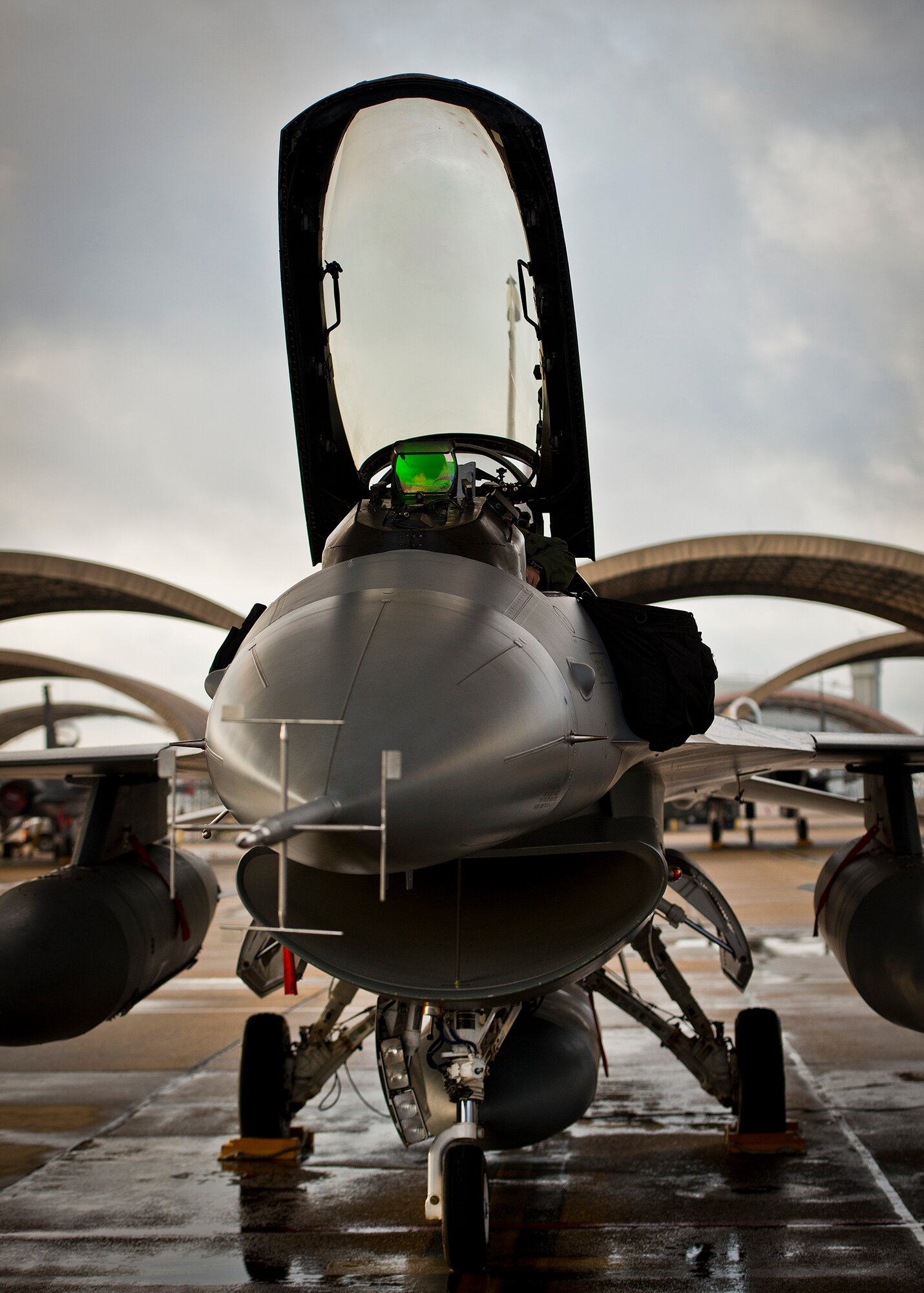 A 96th Test Wing F-16 Fighting Falcon pilot prepares his aircraft for a morning sortie at Eglin Air Force Base, Fla.  The 96th Aircraft Maintenance Squadron is responsible for the maintenance of all the test aircraft for the 96th TW and the 85th Test and Evaluation Squadron.  (U.S. Air Force photo/Samuel King Jr.)