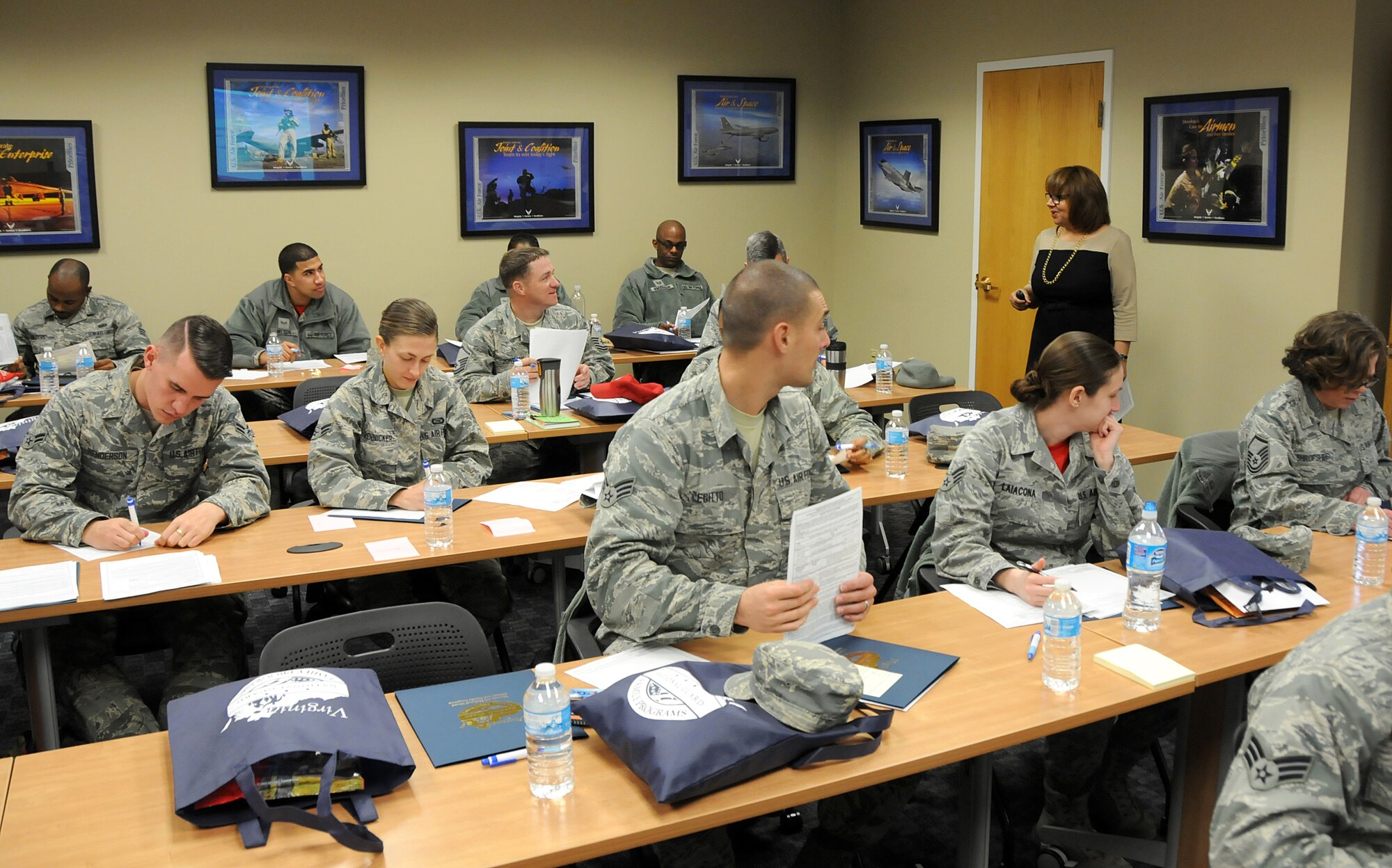 Ms. Angeli Wade, 192nd Fighter Wing Airman and Family Readiness Programs Manager, provides pre-separation counseling to Air National Guard members and Air Force Reservists considering separation or retirement from the military, Jan. 10, 2015 at Langley Air Force Base, Hampton Va.