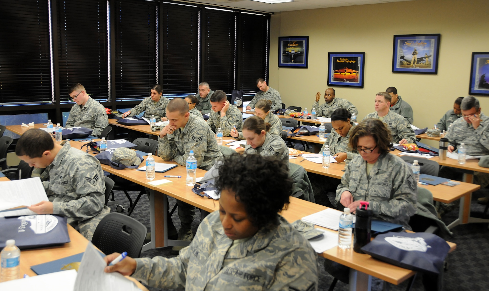 Ms. Angeli Wade, 192nd Fighter Wing Airman and Family Readiness Programs Manager, provides pre-separation counseling to Air National Guard members and Air Force Reservists considering separation or retirement from the military, Jan. 10, 2015 at Langley Air Force Base, Hampton Va.