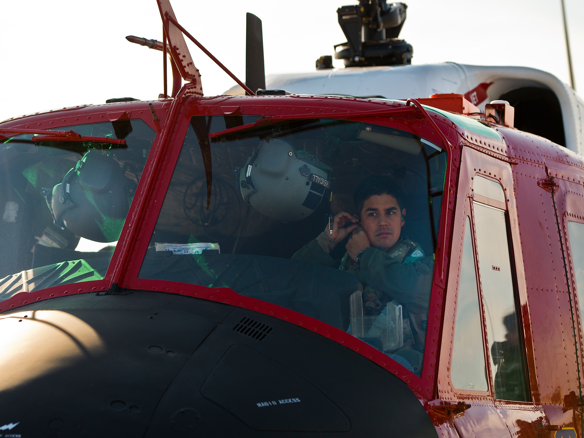 Tech. Sgt. Joe Kendall, a special missions aviator with the 413th Flight Test Squadron, prepares for flight in the UH-1 Huey at Duke Field Fla. The 413th FLTS provides developmental testing to rotary wing aircraft such as the UH-1, CV-22 and the C-130.  (U.S. Air Force photo/Samuel King Jr.)