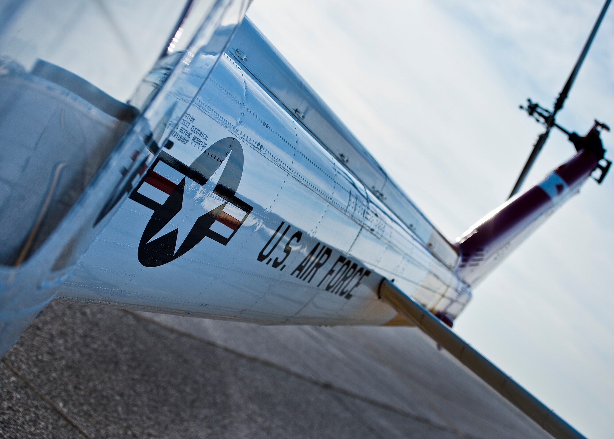 A 413th Flight Test Squadron UH-1 Huey sits ready for its next sortie on the flightline at Duke Field, Fla.  The 413th FLTS provides developmental testing to rotary wing aircraft such as the UH-1, CV-22 and the C-130.  (U.S. Air Force photo/Samuel King Jr.)