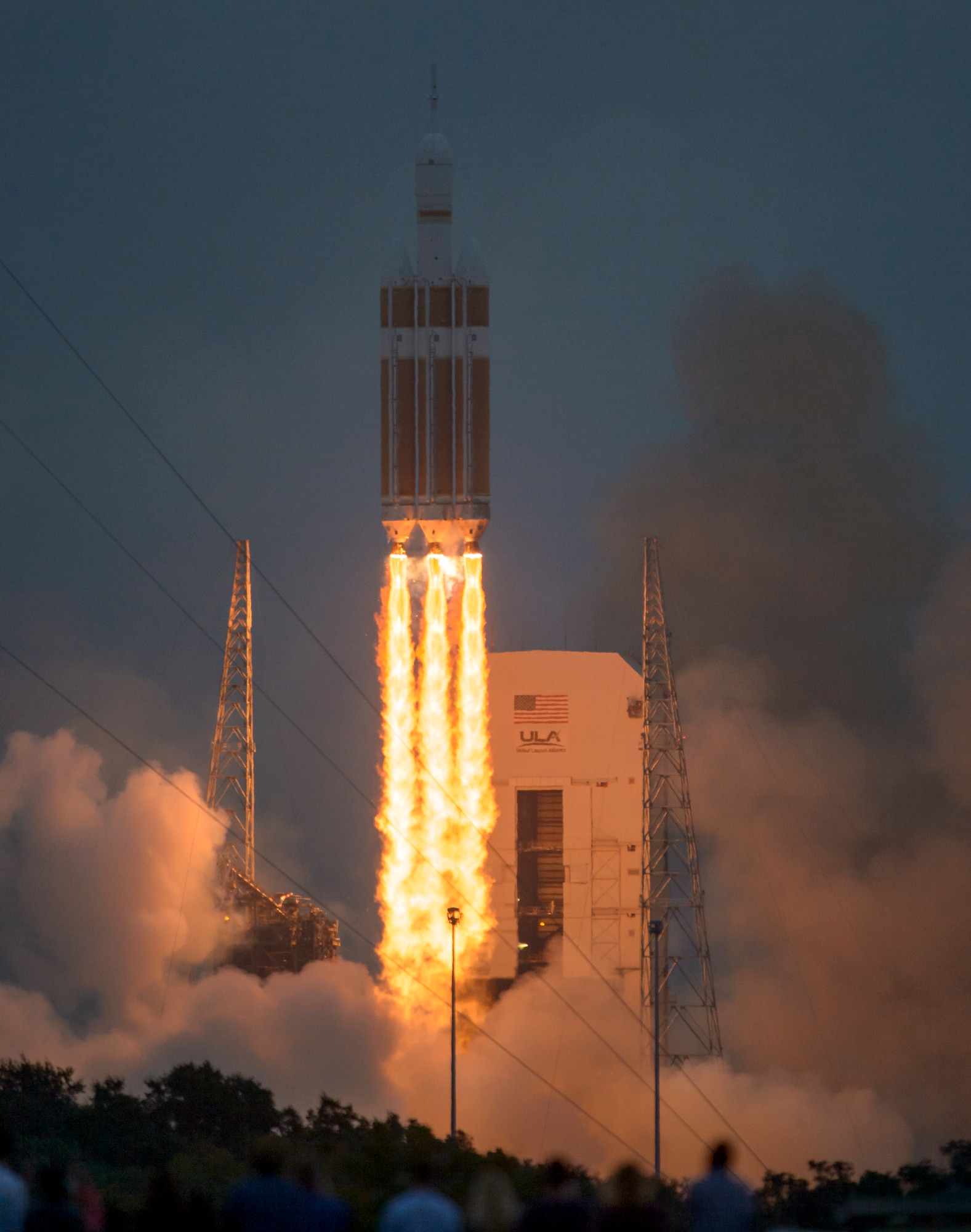 The United Launch Alliance Delta IV Heavy rocket, with NASA’s Orion spacecraft mounted atop, lifts off from Cape Canaveral Air Force Station's Space Launch Complex 37 at 7:05 a.m. EST, Dec. 5, in Florida. AEDC test teams supported Exploration Flight Test-1 by assisting in testing several key components for the aircraft. (Photo by Bill Ingalls, NASA)