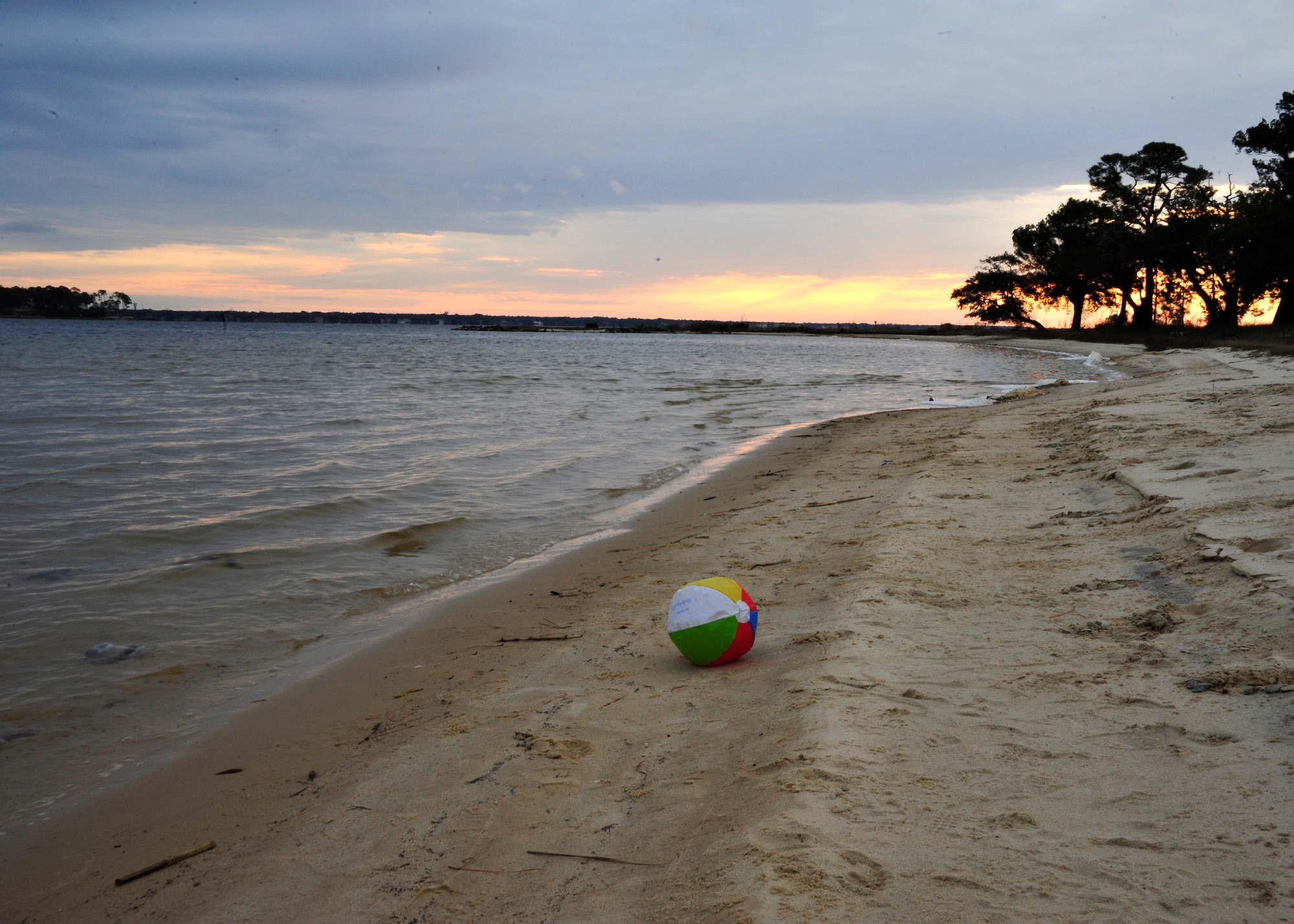 A beach ball and dozens of foot prints in the sand at Post’l Point mark the close of Eglin’s annual Polar Bear Plunge, Jan. 9.  Approximately 50 people braved frigid morning temperatures to rush into the 57 degree water.  According to local weather reports, it was 32 degrees with a 27 degree wind chill factor. (U.S. Air Force photo/Ilka Cole)