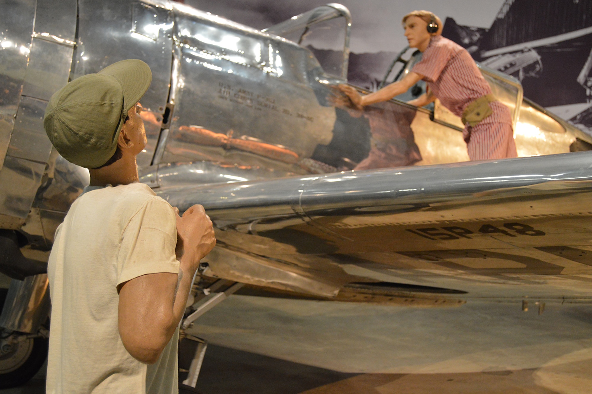 DAYTON, Ohio -- Curtiss P-36A Hawk diorama with a portrayal of Lt. Phillip Rasmussen in the World War II Gallery at the National Museum of the United States Air Force. (U.S. Air Force photo) 
