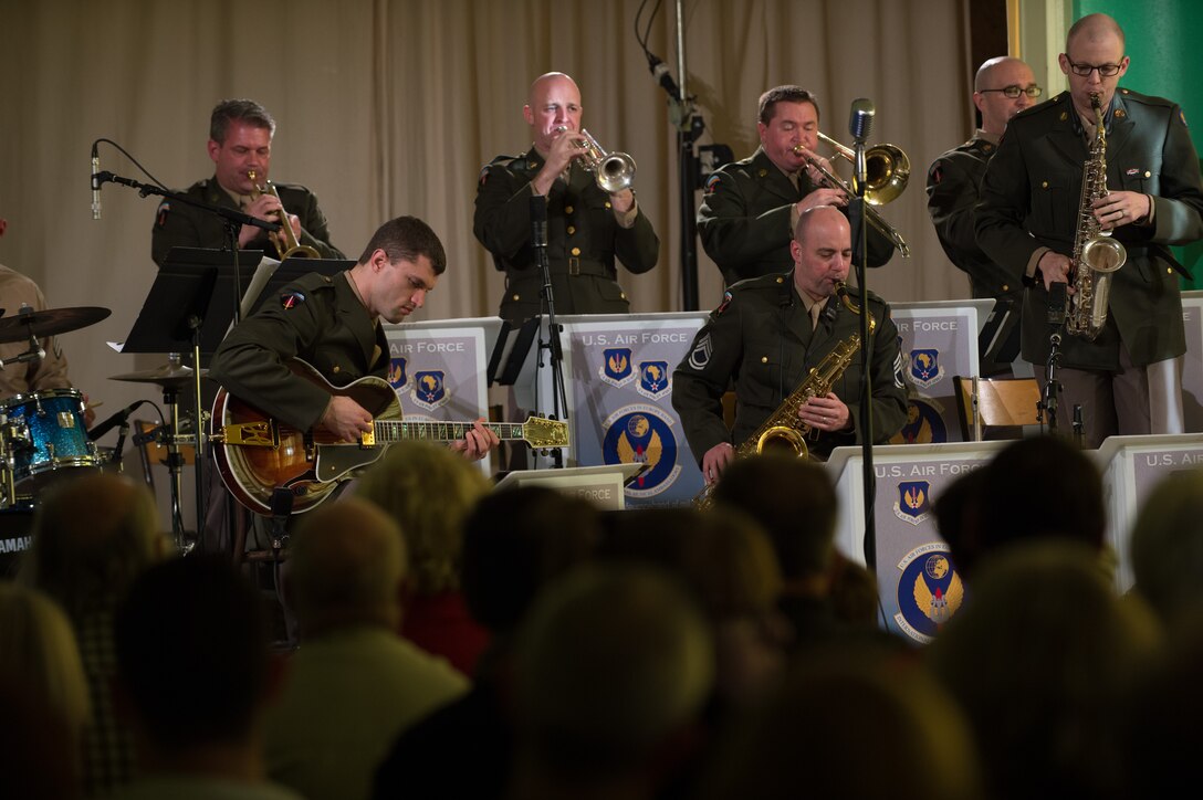 The U.S. Air Forces in Europe Band perform during a Battle of the Bulge 70th anniversary commemoration event, Nov. 23, 2014, in Saulcy-sur Meurthe, France. The USAFE Band played throughout Europe since September stopping at villages that were affected by the battle. The band featured approximately 20 songs from the 1940s, bringing joy and nostalgia to the audience. (U.S. Air Force photo/Senior Airman Jonathan Stefanko)