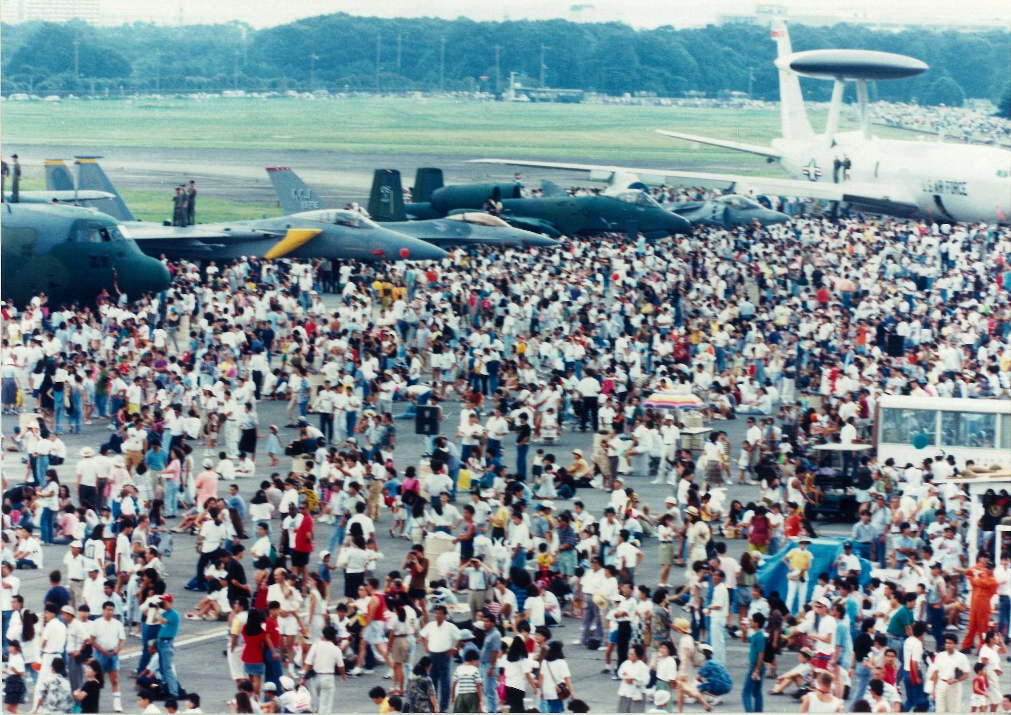 A 1 September 1991 view of a very large crowd enjoying Yokota's annual
Friendship Festival. (Photo courtesy of the 374 AW History Office.)
