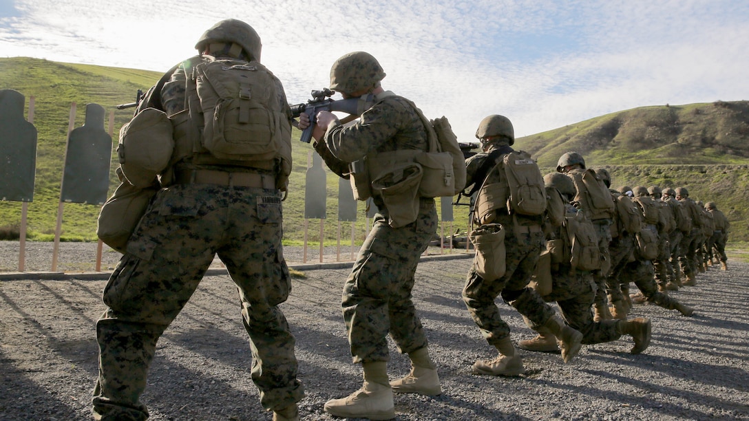 Marines with Marine Wing Communications Squadron (MWCS) 38 shoot M14A4 rifle on Range 109 during Back in the Saddle training aboard Marine Corps Base Camp Pendleton, Calif., Jan. 7. Marines practiced marksmanship skills all while in full combat gear including Kevlar and flak jacket to make the training seem as real as possible.