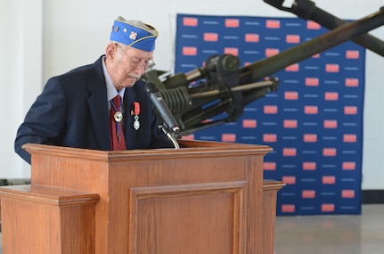 Former Army Lt. Cary Jarvis, a World War II veteran who landed in the first wave on the beaches of Normandy on D-Day with the Virginia National Guard’s 111th Field Artillery Battalion, 29th Infantry Division, is recognized as a Knight in the French Legion of Honor by retired French Consulate Nicole Yancey Jan. 11, 2015, in Norfolk, Va. 