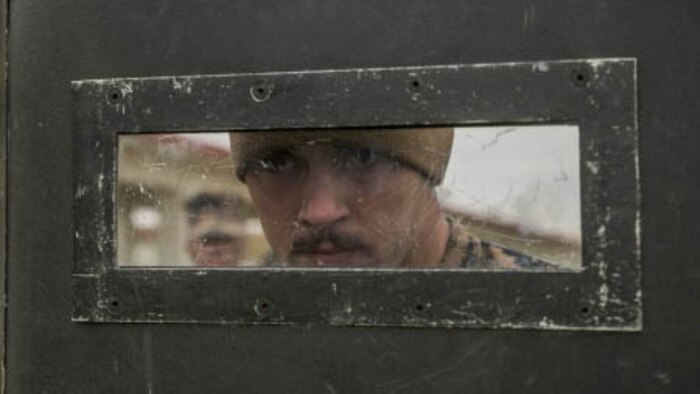 Pfc. William Baker, a prospect for the Special Reaction Team, holds a shield during close-quarters battle training Jan. 8 at Camp Hansen. Baker is a San Antonio, Texas, native. The special reaction team is with the Provost Marshal’s Office, Marine Corps Installations Pacific-Marine Corps Base Camp Butler, Japan. The team is the military equivalent of Special Weapons and Tactics teams. 