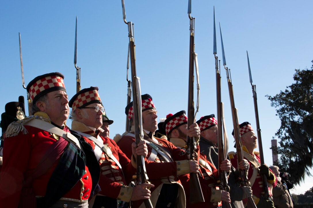 Volunteers reenact as Scottish Highlanders during a color guard demonstration, Jan. 8, 2015 at the Jean Lafitte National Historic Park and Preserve in New Orleans. A series of living history events were held at the Chalmette Battlefield in Chalmette, La., to commemorate the bicentennial of the 1815 Battle of New Orleans. 