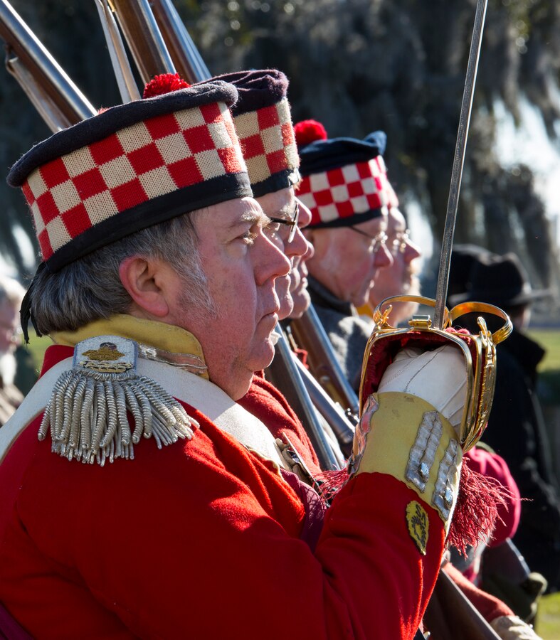 Volunteers reenacting as Scottish Highlanders during a color guard demonstration, Jan. 8, 2015 at the Jean Lafitte National Historic Park and Preserve in New Orleans. A series of living history events were held at the Chalmette Battlefield in Chalmette, La., to commemorate the bicentennial of the 1815 Battle of New Orleans. 