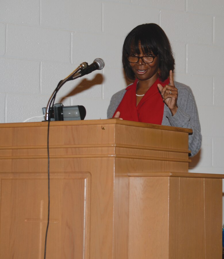 Speaking from the premise of “reinvigorating our call to action,” guest speaker, former Juvenile Court Judge, Karen Baynes-Dunning, addresses a capacity crowd at the installation’s 2015 Dr. Martin Luther King Jr. holiday observance, Jan. 13, 2015.