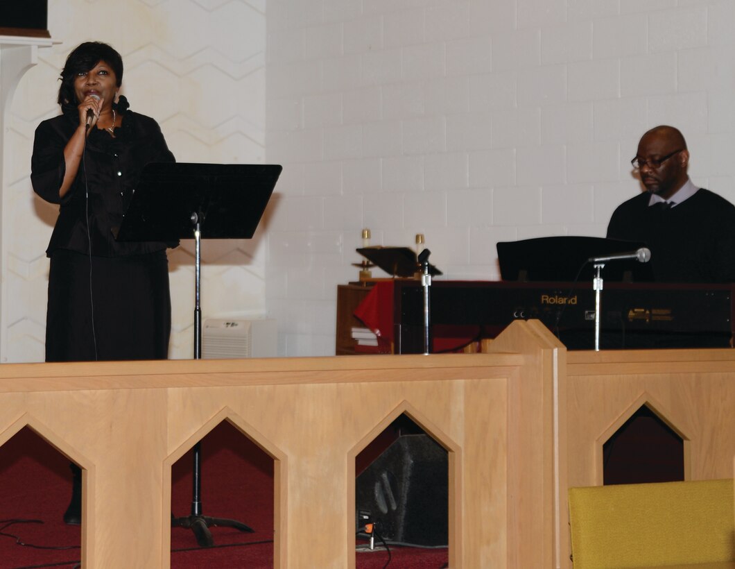 Jackie Johnson, a member of Marine Corps Logistics Command, honors Dr. Martin Luther King Jr. with her singing during Marine Corps Logistics Base Albany's observance of the late civil rights leader's birthday.