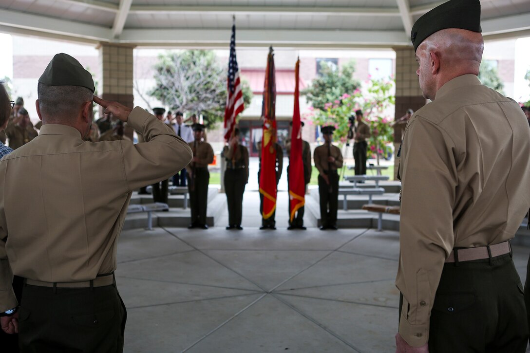 Lieutenant Gen. David H. Berger, commanding general of I Marine Expeditionary Force and Brig. Gen. Daniel D. Yoo, commanding general of Marine Expeditionary Brigade - Afghanistan salute the colors at a deactivation ceremony for MEB-A aboard Camp Pendleton, Calif., Jan. 9; symbolically closing another chapter in Marine Corps history following the 13-year conflict known as Operation Enduring Freedom. Marine Expeditionary Brigade - Afghanistan officially took authority of Regional Command (Southwest) from II Marine Expeditionary Force (Forward) Feb. 5, 2014, and assumed the responsibility to lead coalition operations in Helmand and Nimroz provinces. The Marines completed operations and departed Afghanistan Oct. 27, 2014.