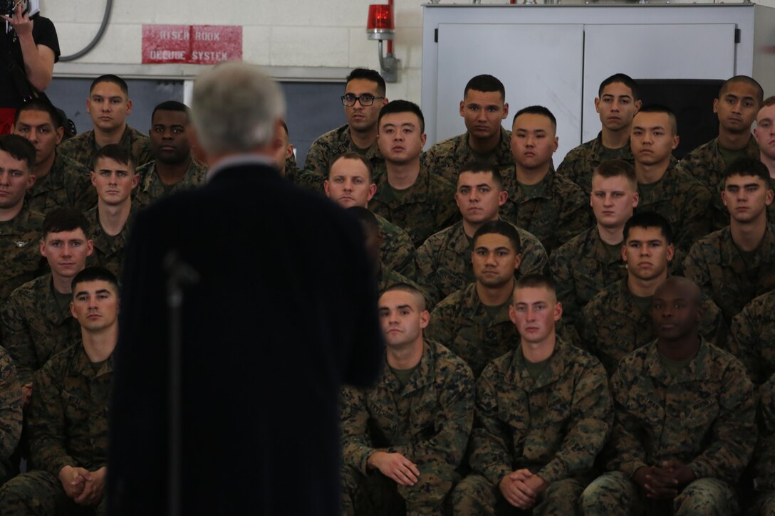 Marines and Sailors listen as Chuck Hagel, secretary of defense, speaks to them during a visit aboard Marine Corps Air Station Miramar, Calif., Jan. 13. Marines and Sailors also had the opportunity to ask questions, take photos with Hagel and receive coins.