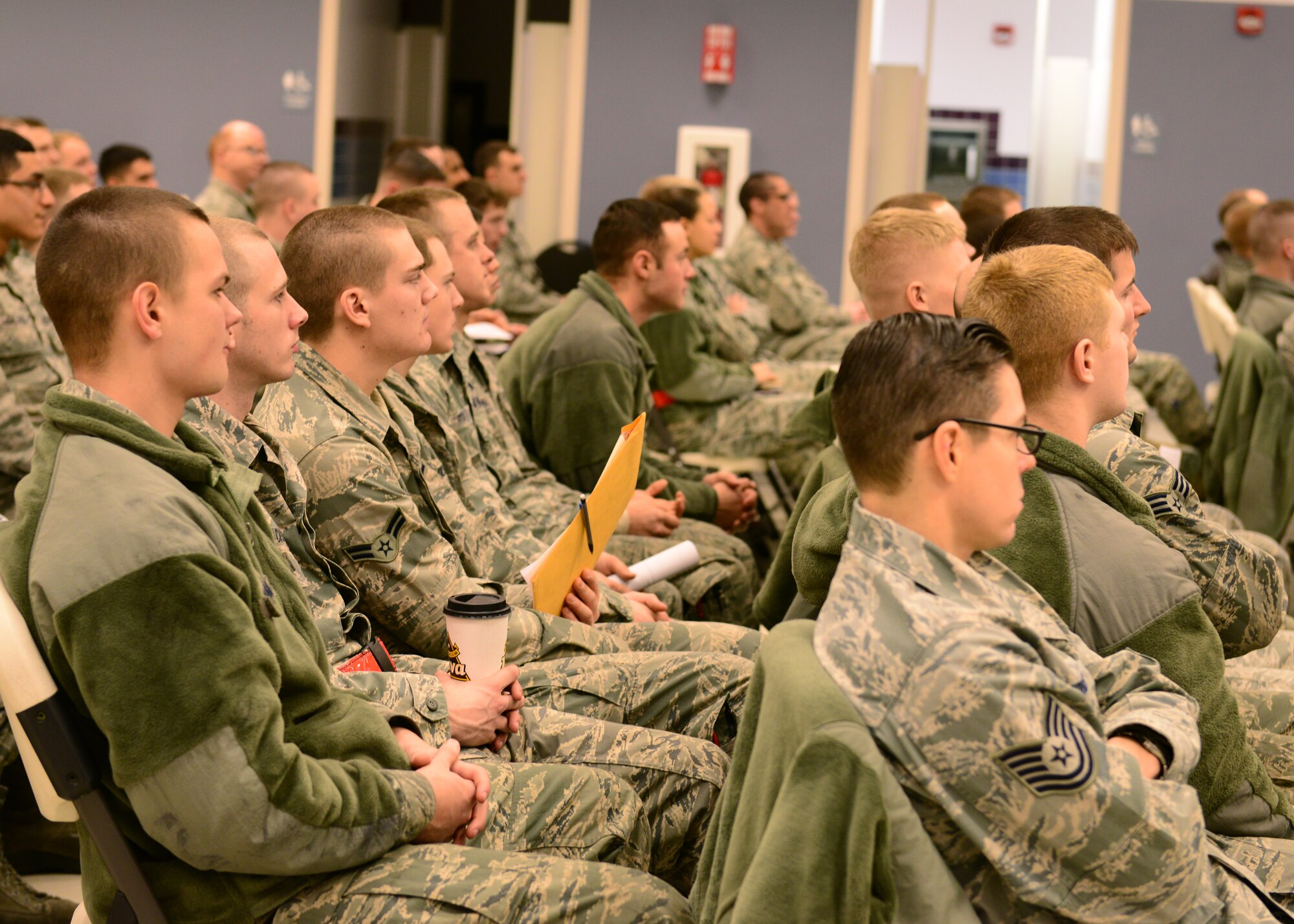 U.S. Airmen from the 354th Fighter Wing receive a pre-deployment brief Jan. 13, 2015, at the Stevens Joint Mobility Complex at Eielson Air Force Base, Alaska. Multiple base agencies briefed Airmen to prepare them for the COPE NORTH exercise. (U.S. Air Force photo by Senior Airman Ashley Nicole Taylor/Released)