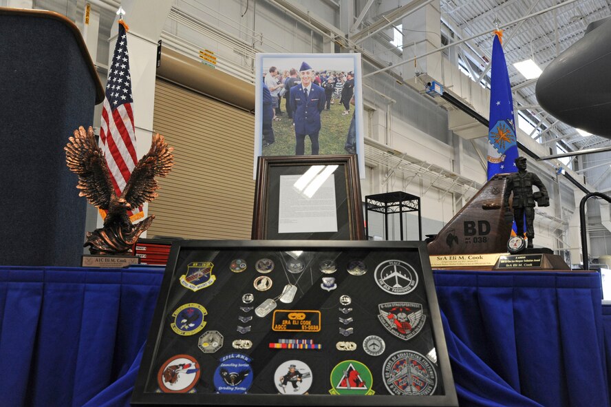 A memorial service for Senior Airman Eli Cook, 2nd Aircraft Maintenance Squadron, was held at the Weapons Load Training Facility on Barksdale Air Force Base, Jan. 8, 2014. Cook, a B-52H Stratofortress assistant dedicated crew chief, succumbed to injuries sustained in a vehicular accident that occurred Jan. 2 in Shreveport, La., Airman Cook entered the Air Force in January 2013, and was assigned to Barksdale's 2nd Bomb Wing upon completion of technical training in July 2013.  Once here, he directly supported the 2nd AMXS's 11th Aircraft Maintenance Unit and was known as a leader among his peers, according to Lt. Col. Michael Hammack, 2nd AMXS commander. (U.S. Air Force photo/ Senior Airman Jannelle Dickey)