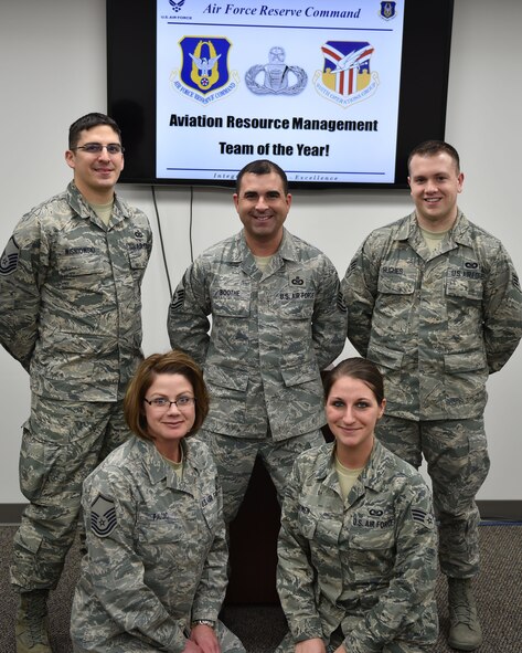 Members of the 910th Operations Group Aviation Resource Management (ARM) team pose for a photo. The team was recently named 2014 Sergeant Dee Campbell Outstanding Small Unit Air Force ARM Team of the year by Air Force Reserve Command. (U.S. Air Force photo/Tech. Sgt. Jim Brock)