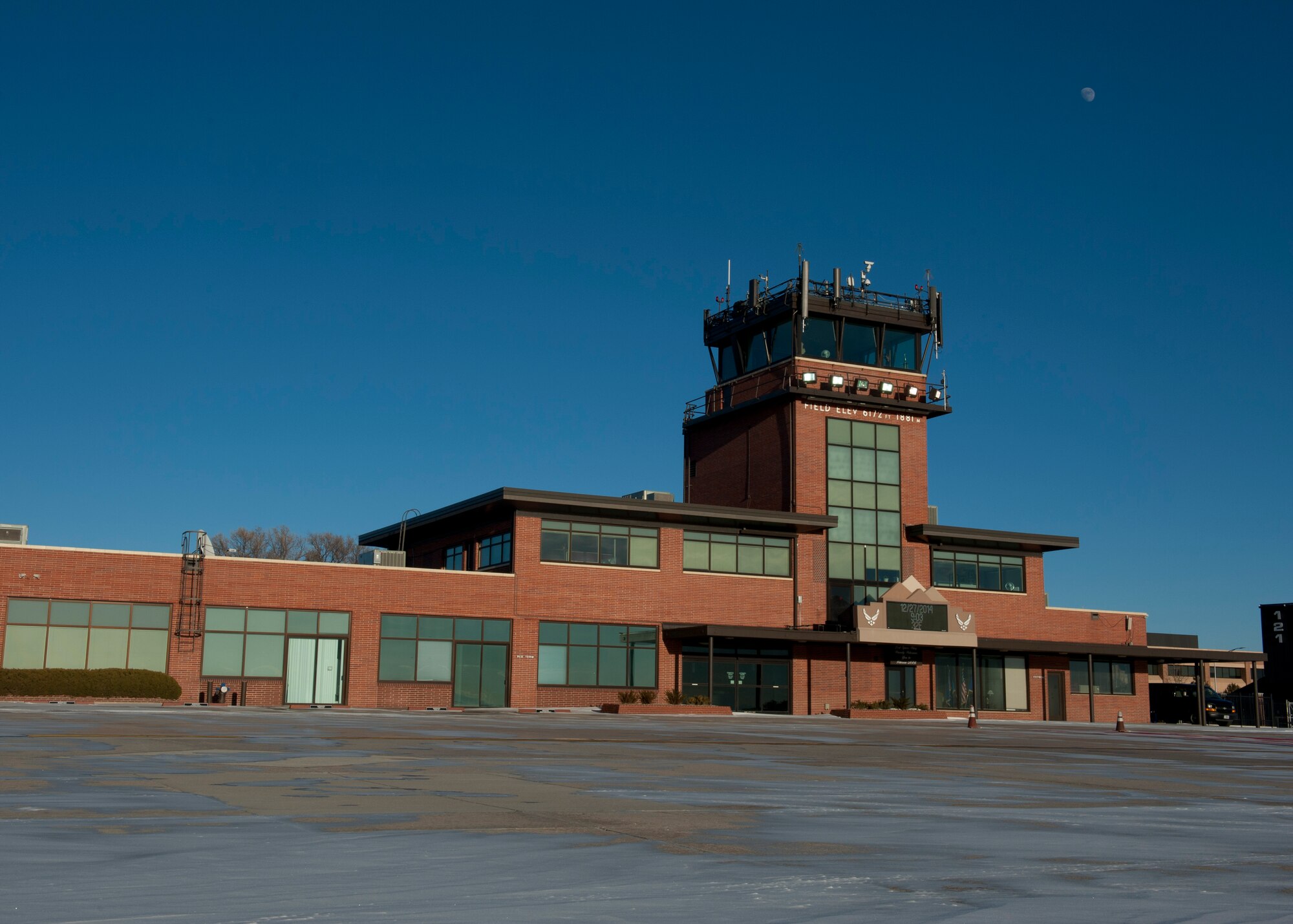 PETERSON AIR FORCE BASE, Colo. – The traffic control tower overlooks the goings-on of the Peterson airfield. Airfield management is responsible for the safety of all incoming and outgoing aircraft and their crews, ranging from inspecting and maintaining the runways, taxiways and aprons of the airfield to responding to in-flight emergencies and coordinating with other base agencies to make aircrews’ stays as efficient as possible. (U.S. Air Force photo by Airman 1st Class Rose Gudex)