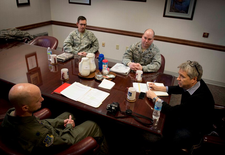 David Taylor, Times of London editor, speaks to 91st Missile Wing leadership on Minot Air Force Base, N.D., Jan. 7, 2014. During the conference, leadership informed Taylor of what to expect while visiting the missile alert facility. (U.S. Air Force photo/Airman 1st Class Sahara L. Fales)
