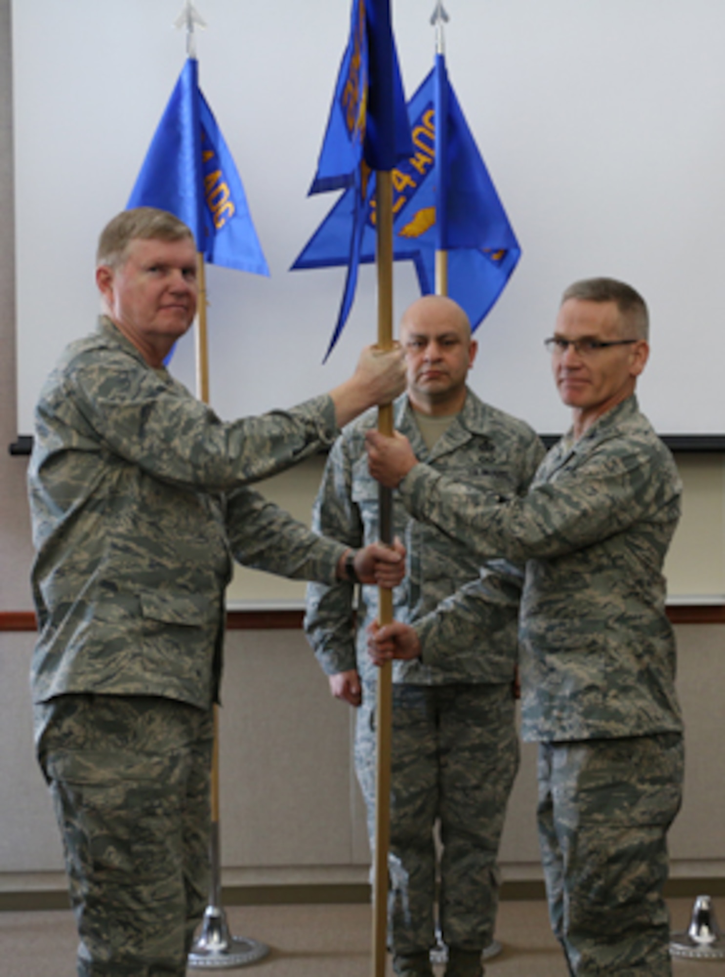 Maj. Gen. Verle Johnston, Commander, New York Air National Guard, passed the 224th Air Defense Squadron guidon to Col. Wendel Smith during a Jan. 10 activation ceremony. 