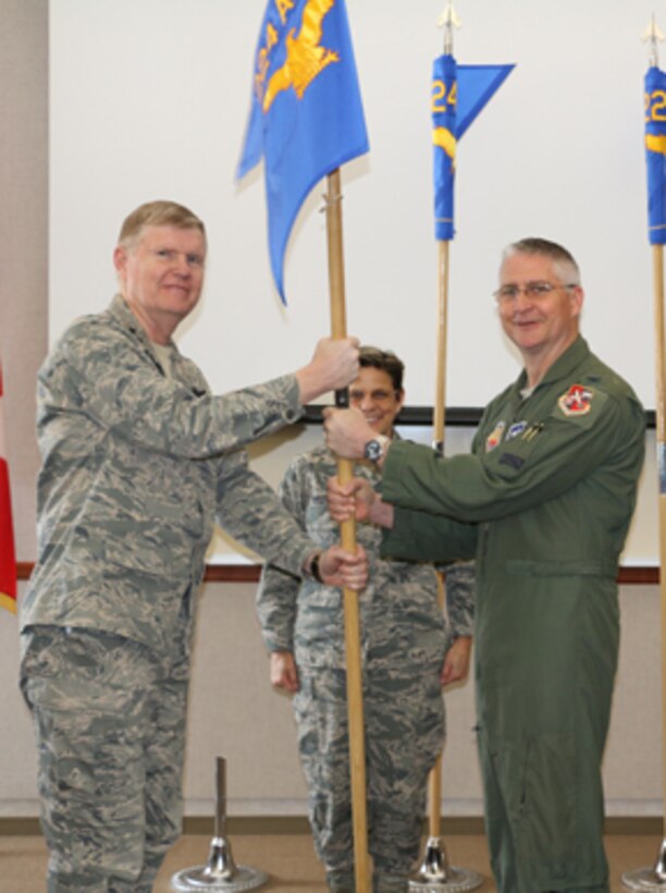 Maj. Gen. Verle Johnston, Commander, New York Air National Guard, passes the 224th Air Defense Group to Col. Wade Dewey during a January 10 activation ceremony.